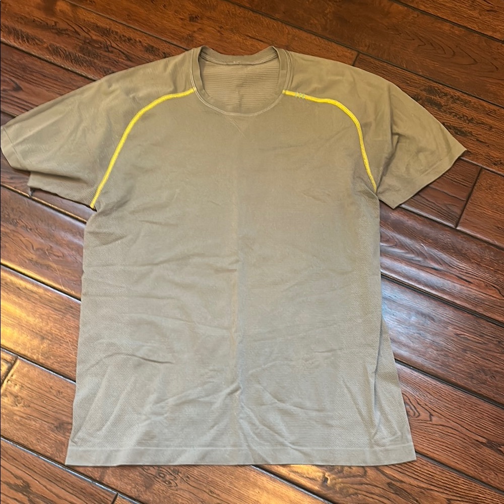 Men’s Lululemon Athletica short sleeved shirt.  Size large.  Beige in color.